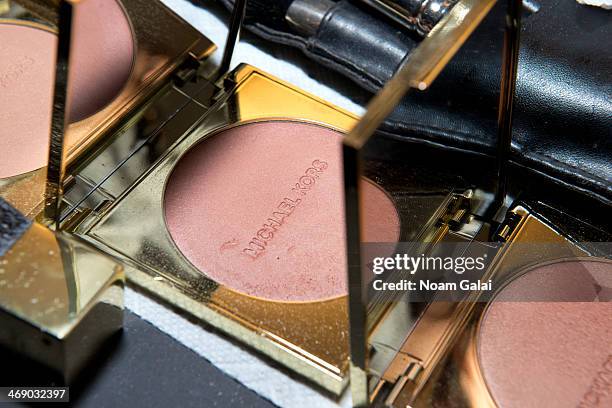 General view of makeup products backstage at the Michael Kors Show during Mercedes-Benz Fashion Week Fall 2014 at Spring Studios on February 12, 2014...