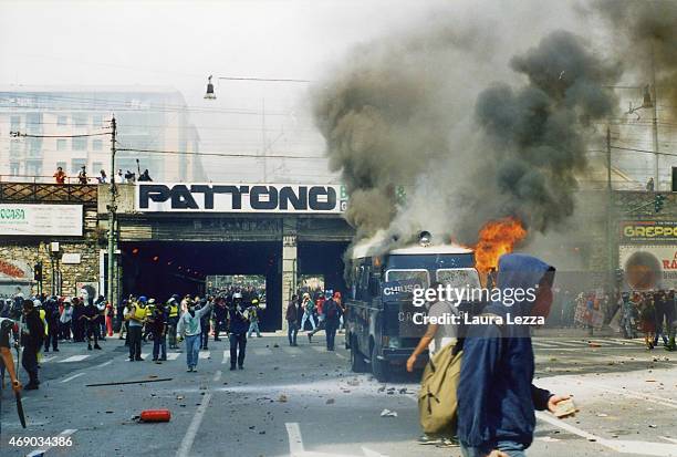 Anti-G8 protestes attack a Carabinieri police armored vehicle on the first day of the G8 Summit on July 20, 2001 in Genoa, Italy. Thousands of anti...
