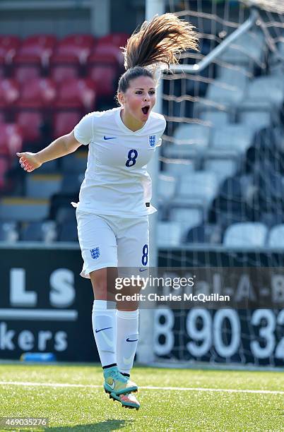 Jenna Dear of England celebrates scoring during the UEFA U19 Women's Qualifier between England and Switzerland at Seaview on April 9, 2015 in...