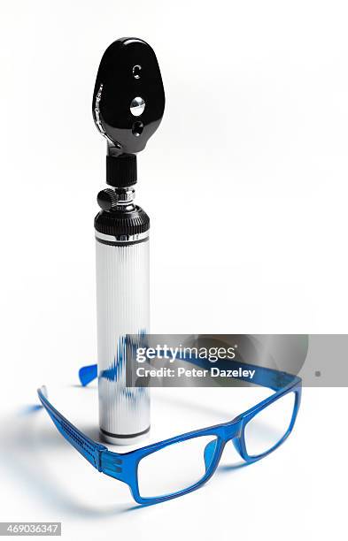 optician ophthalmoscope and spectacles - ophthalmoscope stock pictures, royalty-free photos & images