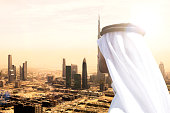 Sheikh looking to Dubai downtown skyscrapers and office buildings