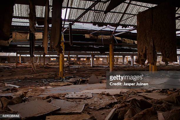 The desolate factory hall of the Puertas Mavisa door factory stands abandoned and redundant on December 20 in Villacanas,, Spain. Everything is...