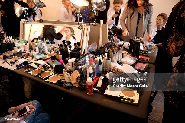 General view of makeup accessories backstage at the Michael Kors Show during Mercedes-Benz Fashion Week Fall 2014 at Spring Studios on February 12,...