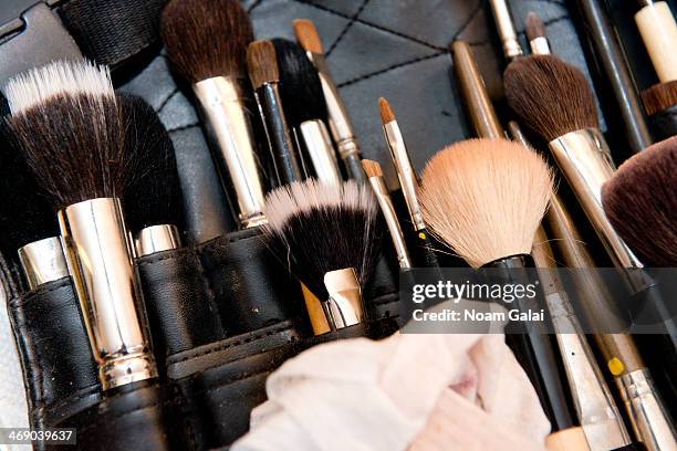 General view of makeup accessories backstage at the Michael Kors Show during Mercedes-Benz Fashion Week Fall 2014 at Spring Studios on February 12,...