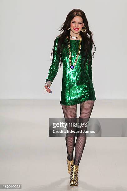 Model walks the runway at Betsey Johnson during Mercedes-Benz Fashion Week Fall 2014 at The Salon at Lincoln Center on February 12, 2014 in New York...