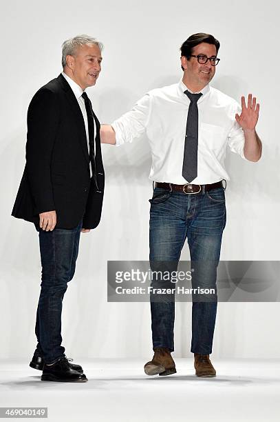 Designers Isaac Franco and Ken Kaufman walk the runway at the Kaufmanfranco fashion show during Mercedes-Benz Fashion Week Fall 2014 at Lincoln...