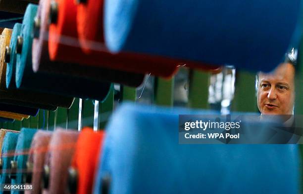 Prime Minister David Cameron visits Camira, a textile factory in Colne Valley, Yorkshire on April 9, 2015 in Colne, England. Britain goes to the...