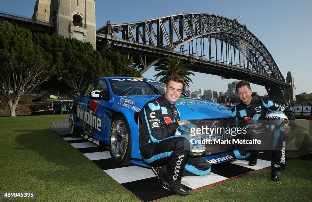 Drivers Scott McLaughlin and Robert Dahlgren pose in front of the Volvo S60 race car during the Volvo Polestar Racing 2014 V8 Supercar launch on...