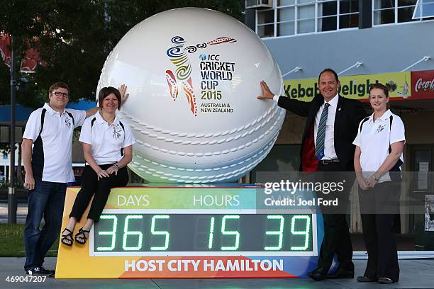 Staff with the countdown clock showing the number of days until the start of the ICC 2015 Cricket World Cup during the "One Year To Go" to the ICC...