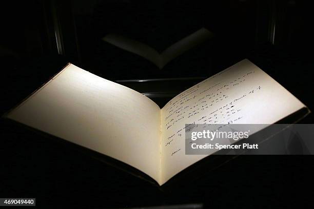 The 1942 56-page notebook belonging to codebreaker Alan Turing is displayed at Bonham's auction house on April 9, 2015 in New York City. The...