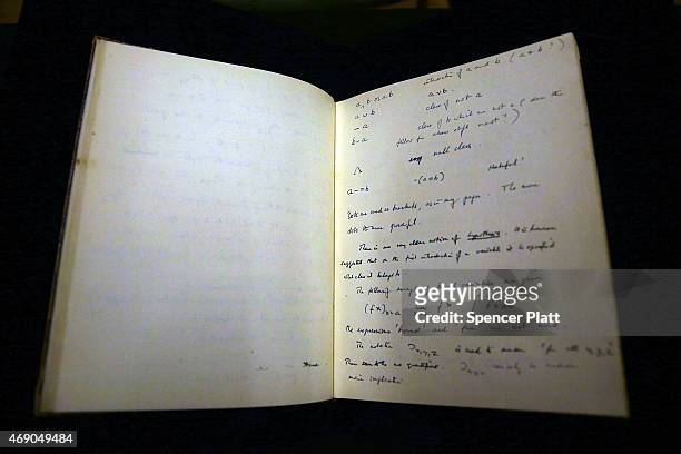 The 1942 56-page notebook belonging to codebreaker Alan Turing is displayed at Bonham's auction house on April 9, 2015 in New York City. The...