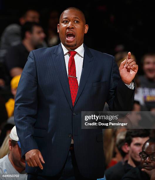 Head coach Melvin Hunt of the Denver Nuggets leads his team against the Los Angeles Lakers at Pepsi Center on April 8, 2015 in Denver, Colorado. The...