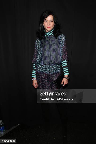 Actress Michele Hicks poses backstage at the Anna Sui fashion show during Mercedes-Benz Fashion Week Fall 2014 at The Theatre at Lincoln Center on...