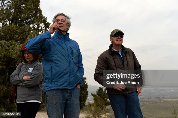 Gregory Rouch Greg Thomas and Roger Rouch, a volunteer with Hawk Watch see a dot on ...