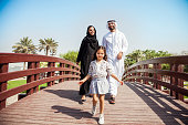 Happy young traditional family in Dubai, UAE