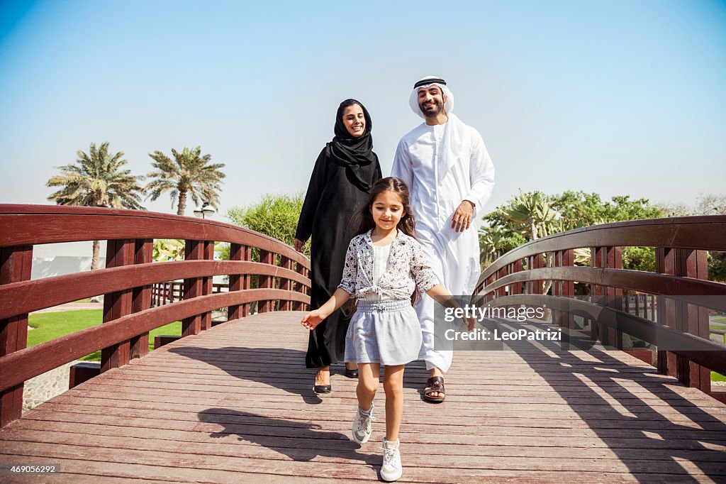 Happy young traditional family in Dubai, UAE