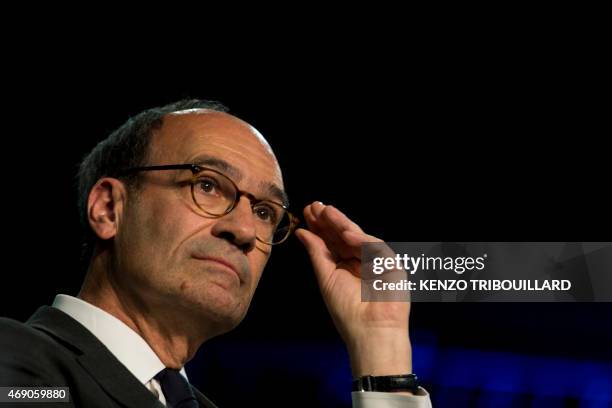 Former French budget minister Eric Woerth attends a political meeting with Former French President and current UMP right-wing party President, on...