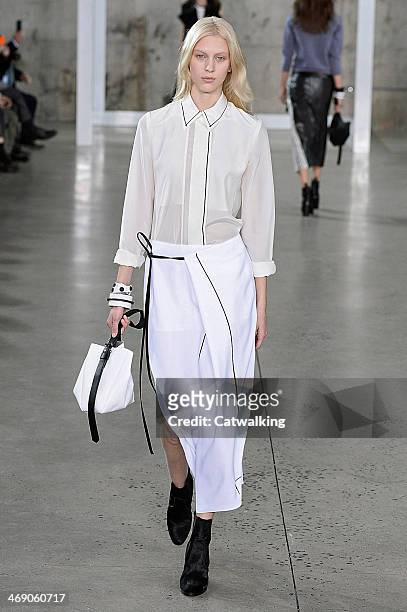 Model walks the runway at the Reed Krakoff Autumn Winter 2014 fashion show during New York Fashion Week on February 12, 2014 in New York, United...