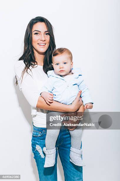 my little girl and me - mother holding baby white background stock pictures, royalty-free photos & images