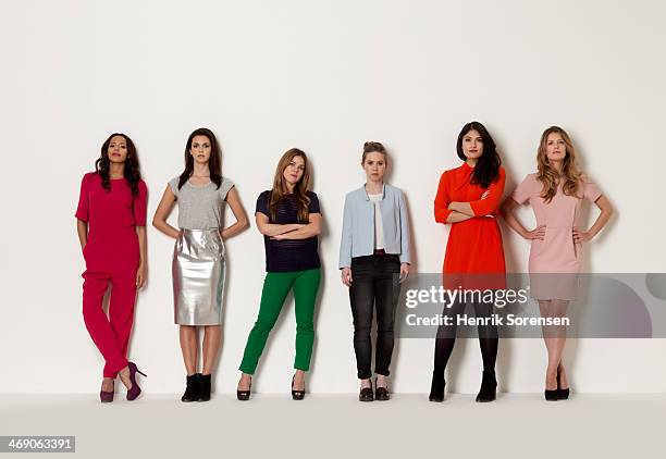 portrait of a group of six women - multi coloured trousers stockfoto's en -beelden