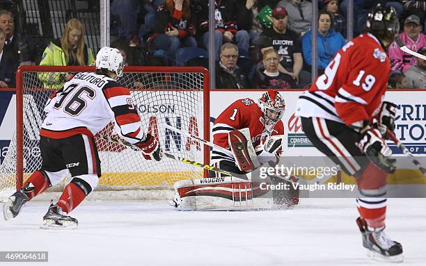 Brandon Hope of the Niagara IceDogs makes a save during Game 6 of the Eastern Conference Quarter-Finals against the Ottawa 67's at the Meridian...