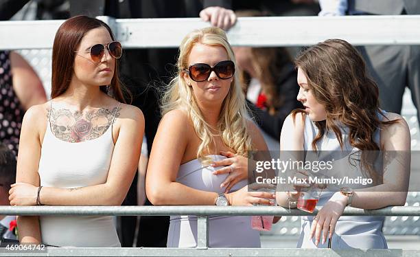 Racegoers attend day 1 'Grand Opening Day' of the Crabbie's Grand National Festival at Aintree Racecourse on April 9, 2015 in Liverpool, England.