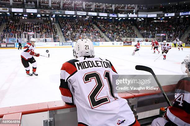 Jacob Middleton of the Ottawa 67's watches the game from the bench during Game 6 of the Eastern Conference Quarter-Finals against the Niagara IceDogs...