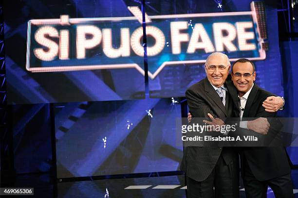 Pippo Baudo and Carlo Conti attend 'Si Puo Fare' Tv Show at RAI Studios on April 9, 2015 in Rome, Italy.