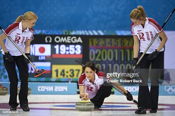 Winter Olympics: View of Team Russia Alexandra Saitova , Margarite Fomina , and Ekaterina Galkina in action during Women's Round Robin Session at Ice...