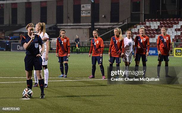 The referee prepares the retaken last minute penalty for Leah Williamson of England during the UEFA U19 Women's Qualifier between England and Norway...