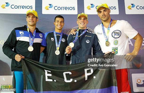 Marcelo Chierighini, Pedro Spajari, Bruno Fratus and Joao de Lucca celebrate the golden medal after winning in the Men's 4x100m freestyle finals on...