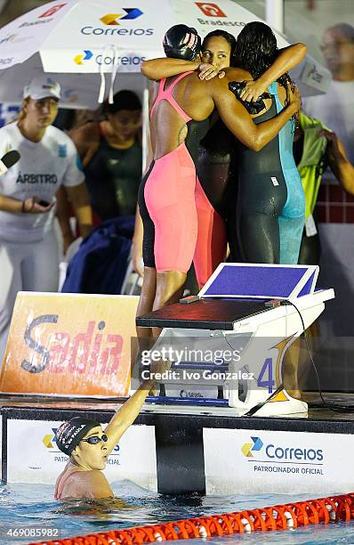 Etiene Medeiros, Jessica Cavalheiro, Priscila de Souza and Daynara de Paula celebrate the winning in the Women's 4x100m freestyle finals on day 4 of...