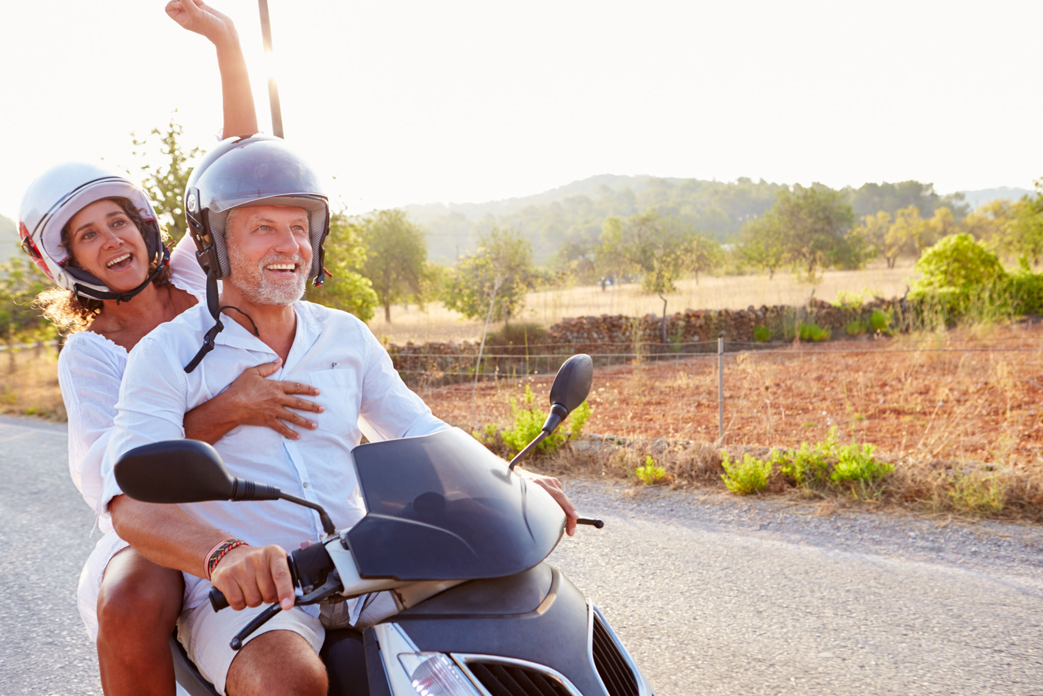 mature couple scooter
