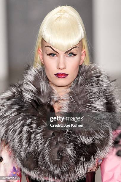 Model walks the runway at the The Blonds fashion show during Fall 2014 MADE Fashion Week Fall 2014 at Milk Studios on February 12, 2014 in New York...