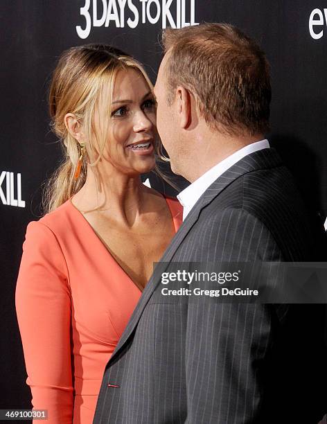 Actor Kevin Costner and wife Christine Baumgartner arrive at the Los Angeles premiere of "3 Days To Kill" at ArcLight Cinemas on February 12, 2014 in...