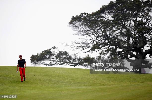 Lee Slattery of England walks on the 9th hole during Day 1 of the Africa Open at East London Golf Club on February 13, 2014 in East London, South...