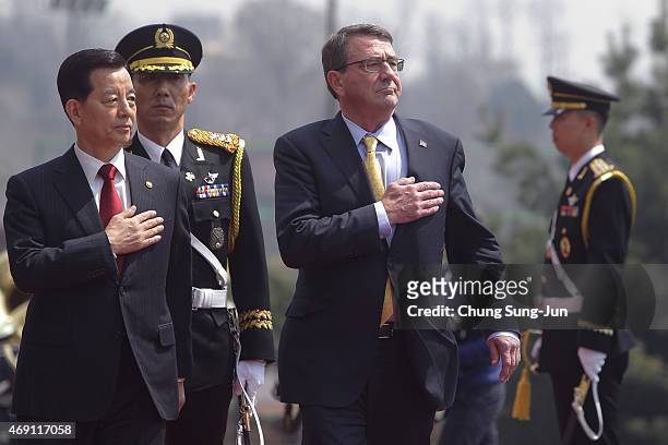 South Korean Defense Minister Han Min-Koo inspects a guard of honour with U.S. Secretary Of Defense Ashton Carter during a welcoming ceremony before...