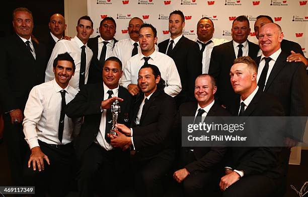 The New Zealand Black Sox pose with the award for New Zealand's Favourite Sporting Moment during the Westpac Halberg Awards at Vector Arena on...