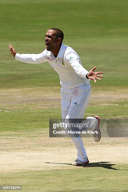 Robin Peterson of South Africa celebrates after he got the wicket of Brad Haddin of Australia during day two of the First Test match between South...