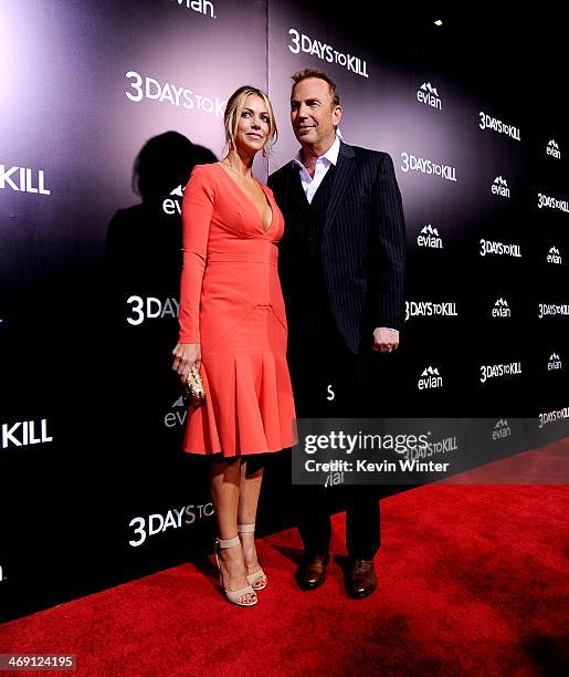 Actor Kevin Costner and his wife Christine Baumgartner arrive at the premiere of Relativity Media's "3 Days To Kill" at the Arclight Theatre on...