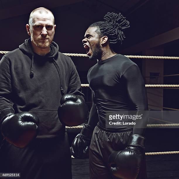 angry black boxer shouting at his opponent - coach yelling stock pictures, royalty-free photos & images