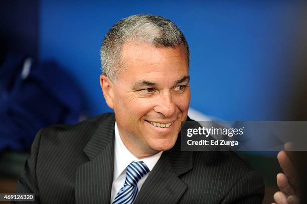 General manager Dayton Moore of the Kansas City Royals looks on prior to an opening day game against the Chicago White Sox on April 6, 2015 at...