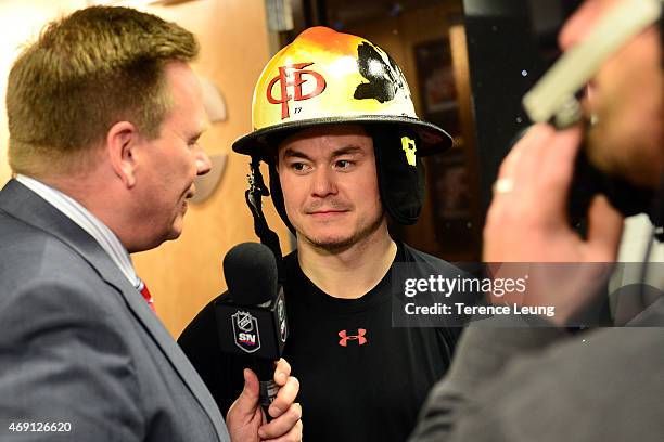 Jiri Hudler of the Calgary Flames addresses the media after a win against the Los Angeles Kings at Scotiabank Saddledome on April 9, 2015 in Calgary,...