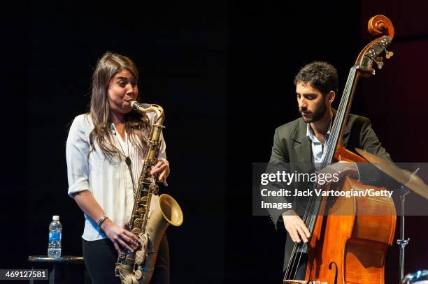 Chilean Jazz musician Melissa Aldana plays tenor saxophone as she leads her group, Crash Trio, with Pablo Milanes on upright acoustic bass, during a...
