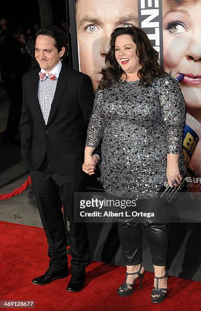 Actor Ben Falcone and actress Melissa McCarthy arrive for the Premiere Of Universal Pictures' "Identity Thief" held at Mann Village Theater on...