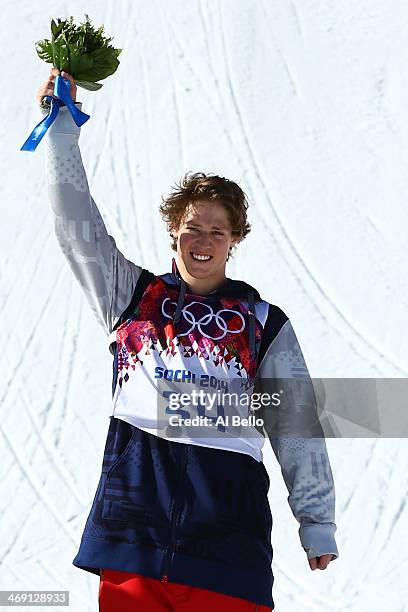 Gold medalist Joss Christensen of the United States stands on the podium during the flower ceremony after the Freestyle Skiing Men's Ski Slopestyle...