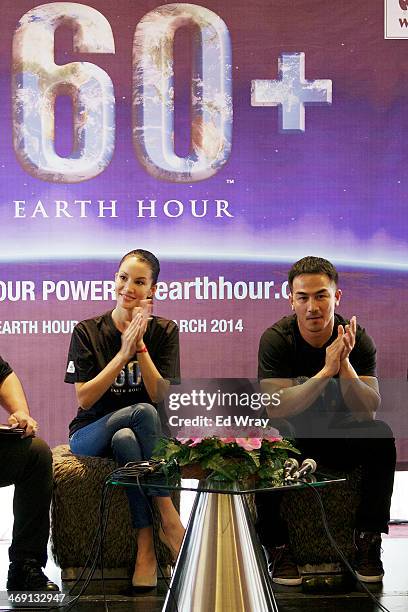 The World Wildlife Fund's Earth Hour Global Ambassador Nadya Hutagalung and WWF Tiger Warrior Joe Taslim applaud after Spiderman was named the new...