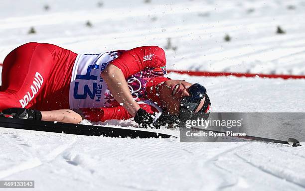 Justyna Kowalczyk of Poland reacts after crossing the finish line during the Ladies' 10km Classic Cross-Country during day six of the Sochi 2014...