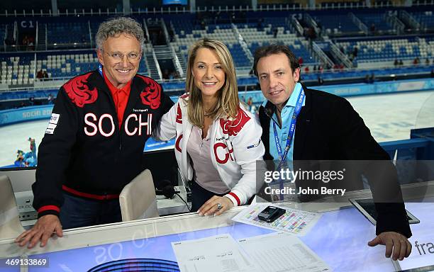 French TV commentators Nelson Monfort, Annick Dumont and Philippe Candeloro pose during the Figure Skating Pairs Free Program on day 5 of the Sochi...