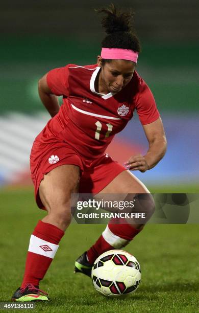 Canada's midfielder Desiree Scott controls the ball during the friendly football match France vs Canada, on April 9, 2015 at the Stade Robert-Bobin...